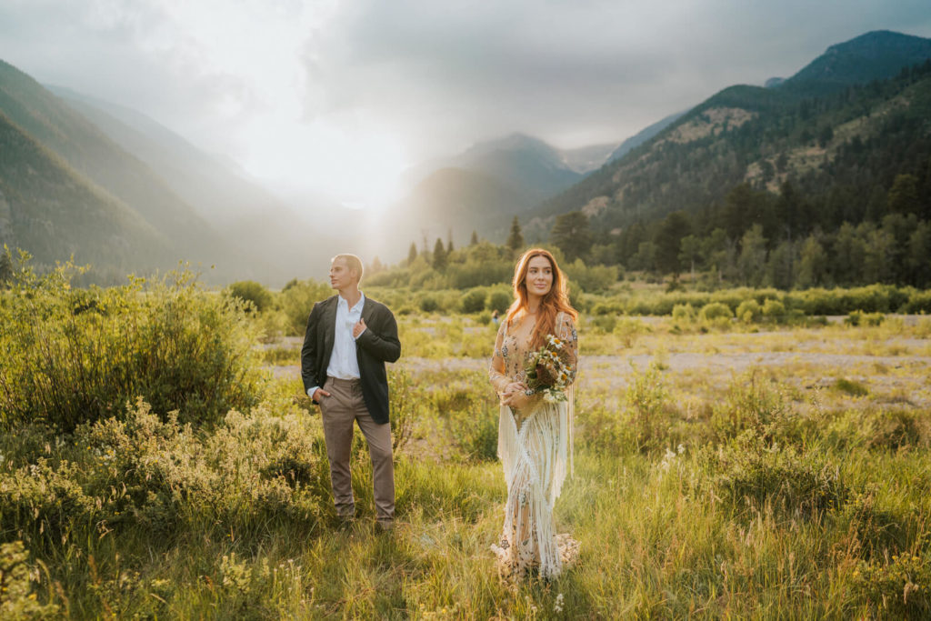 adventurous couple striking a pose after their romantic Rocky Mountain National Park elopement. 
