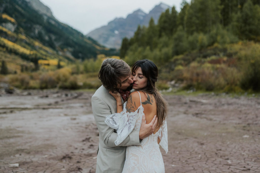 eloping couple savoring a spicy moment during their elopement in Aspen Colorado.